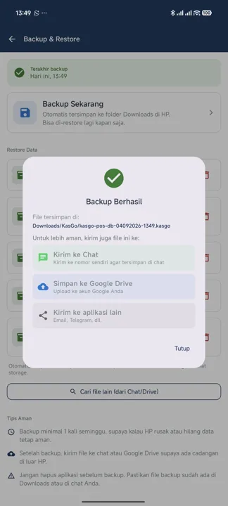 Dialog Backup Berhasil menampilkan lokasi berkas di Downloads/KasGo beserta tiga tombol: Kirim ke Chat, Simpan ke Google Drive, dan Kirim ke aplikasi lain